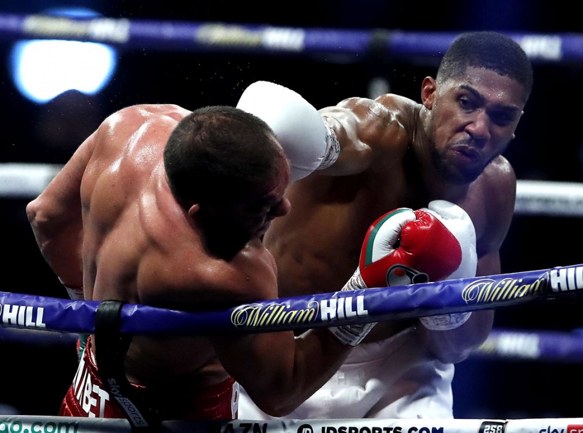 Anthony Joshua defeats Kubrat Pulev to retain heavyweight titles